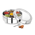 Stainless steel spice container with compartments and a spoon on a white background