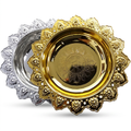 Gold and silver flower dishes on a clean white background